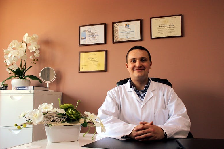 Dr. Borejsza at his desk